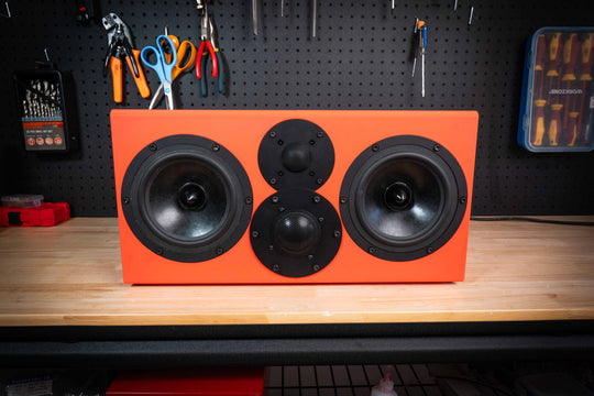 Orange Illuminate 7c three-way centre speaker with twin woofers, midrange and tweeter