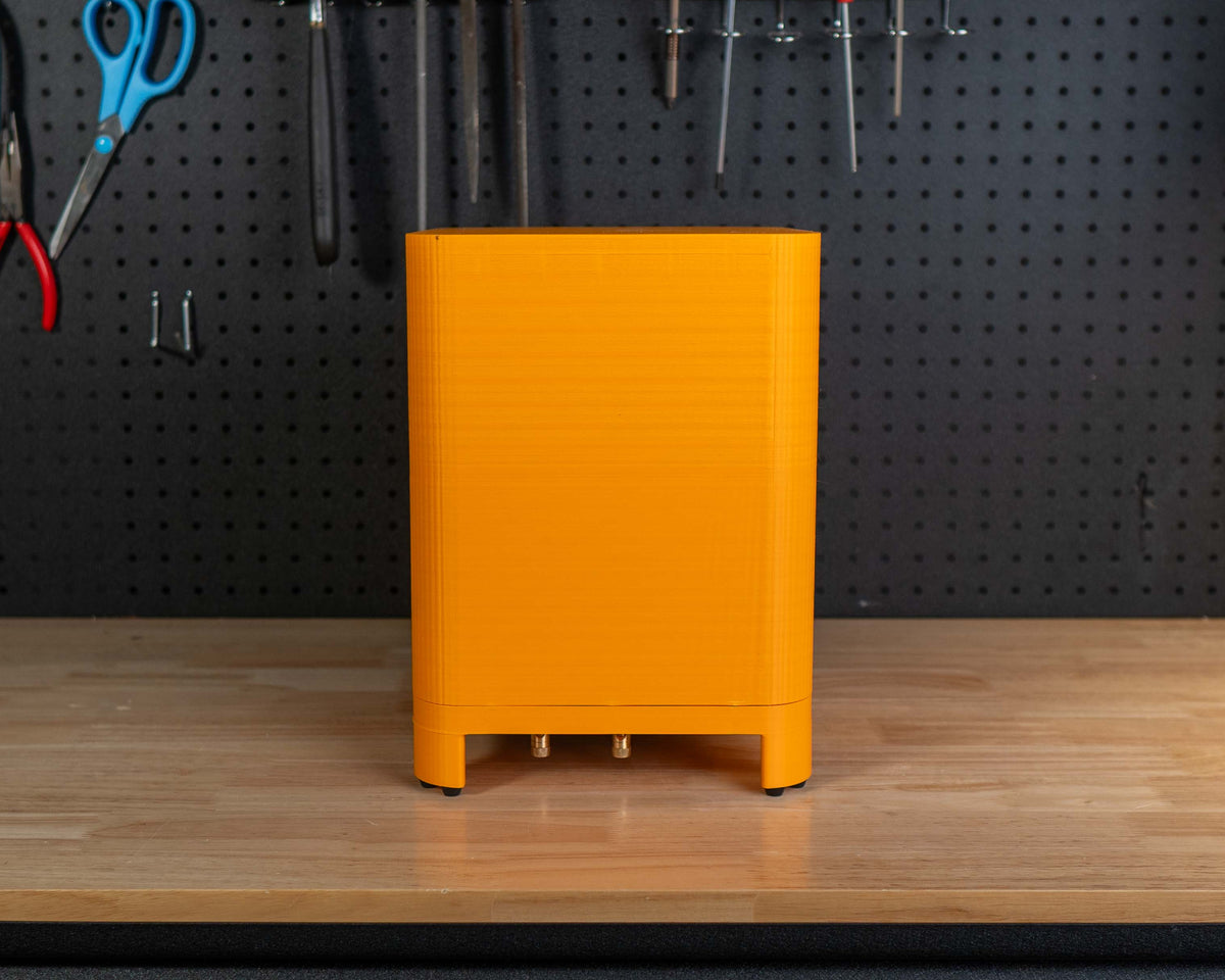 A bright orange subwoofer. 
