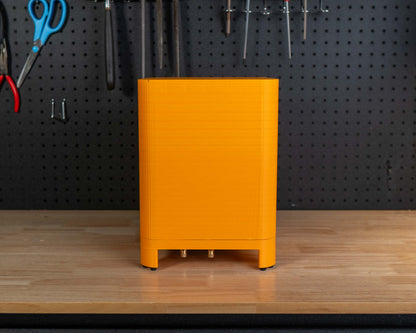 A bright orange subwoofer. 